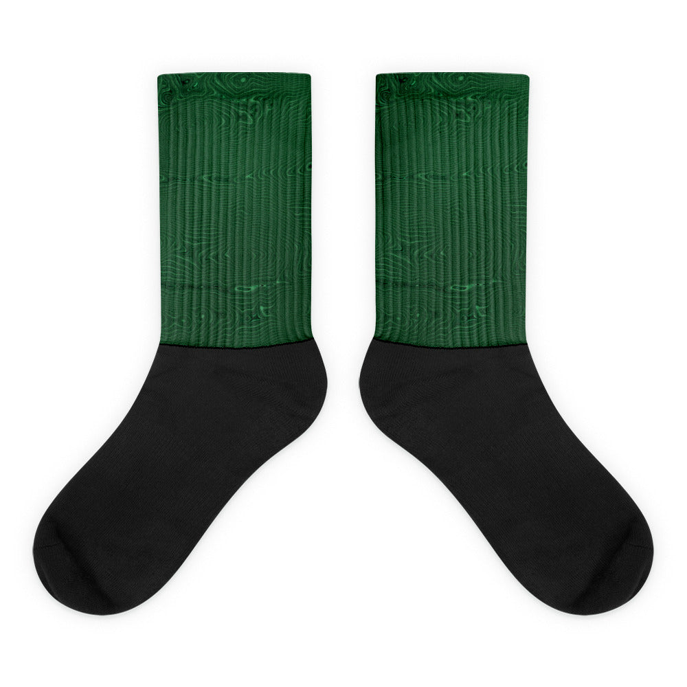 Calcetines con estampado de malaquita verde y pie negro