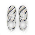 Zapatillas deportivas blancas con bandas diagonales navy y oro del patrón Dinastía