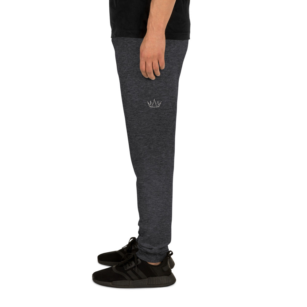 Jogger Street Royalty Corona Lineart negro jaspeado, detalle estampado pierna izquierda